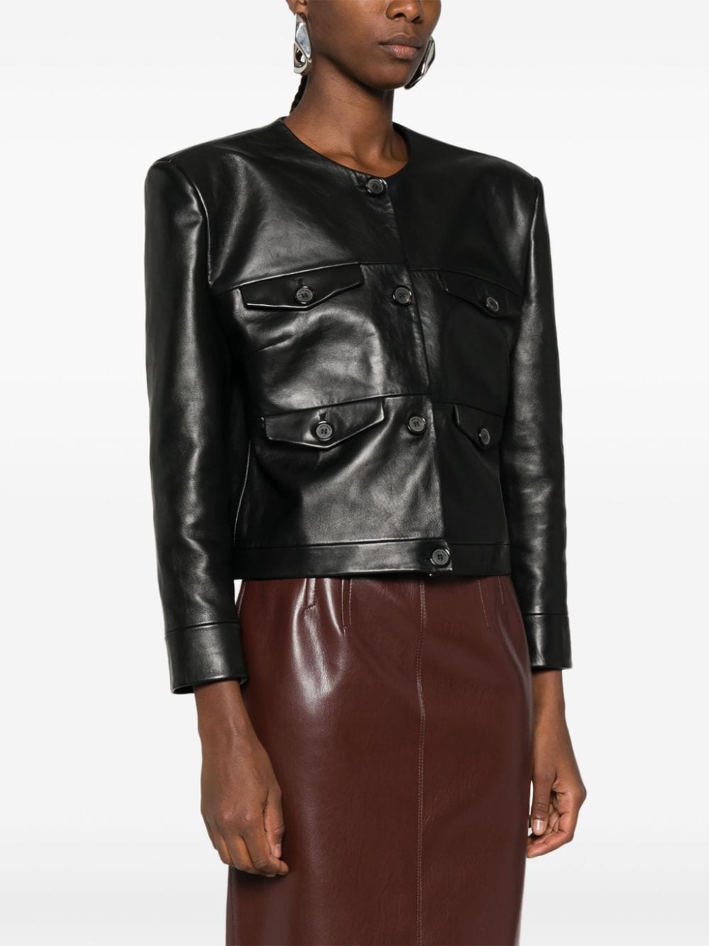 Buttoned leather jacket in black